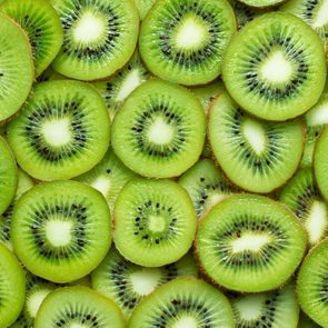 top view of sliced kiwi as background