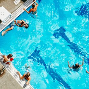 aerial shot of people in swimming pool