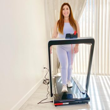 woman using an Under-Desk Treadmill